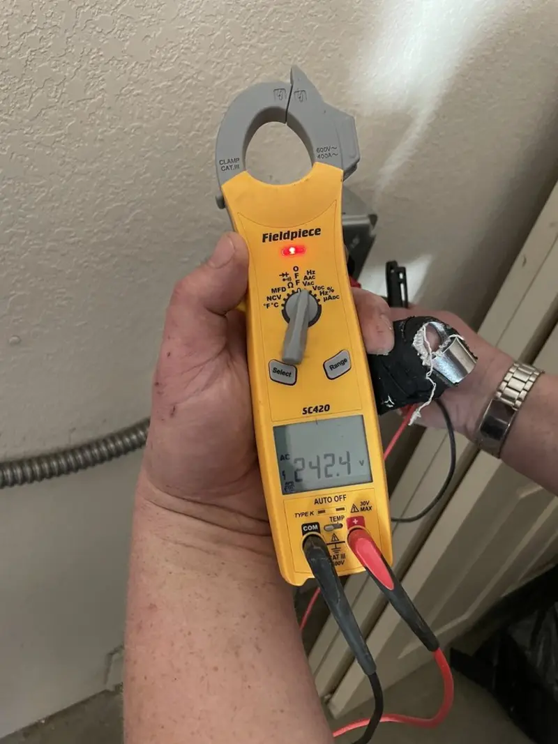 Voltage testing with clamp meter during Generator Installation in Monroeville